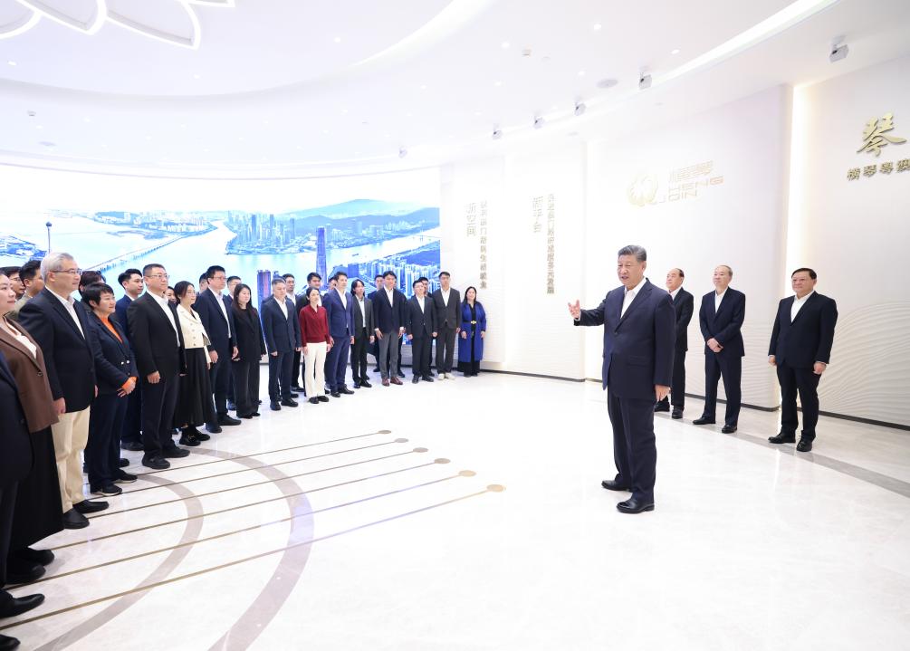 Chinese President Xi Jinping, also general secretary of the Communist Party of China Central Committee and chairman of the Central Military Commission, speaks with individuals involved in the Guangdong-Macao In-Depth Cooperation Zone's planning, construction, management and services, in Hengqin, located at the southern tip of Zhuhai in Guangdong Province, Dec. 19, 2024. Xi, accompanied by Ho Iat Seng, chief executive of the Macao Special Administrative Region (SAR), inspected the cooperation zone on Thursday. (Xinhua/Ju Peng)